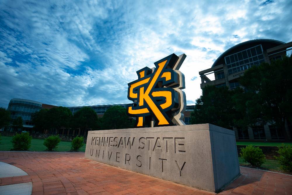 KS sign on the campus green